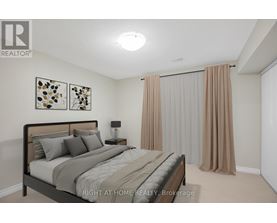 A bedroom with a bed, nightstand, and two framed pictures on the wall.