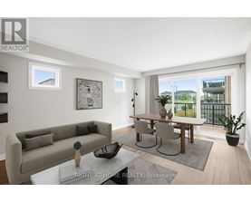 A well-lit living room with a grey sofa, a wooden dining table, and a view of the outside through the window.