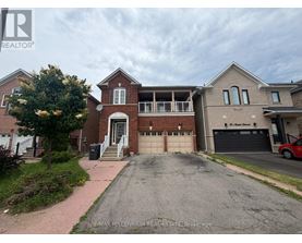 A house with a garage is for sale.