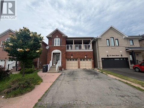 A house with a garage is for sale.