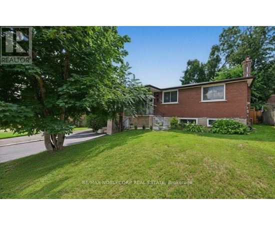 A house with a lawn in front of it is for sale.