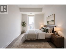 A well-lit bedroom with a large bed and a small potted plant.