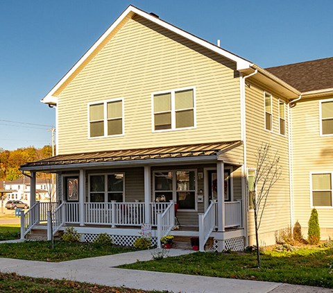 A house with a covered front porch.