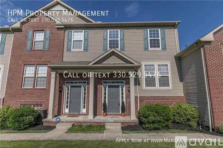 A house with a sign that says HPM Property Management on it.