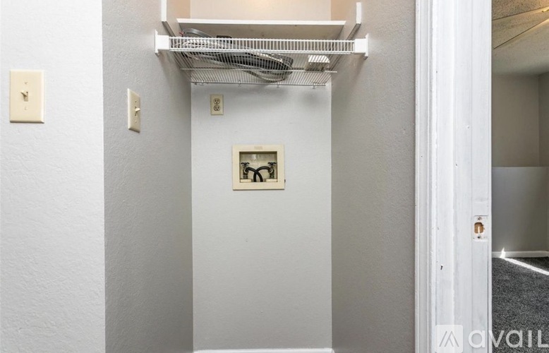 A white door with a small window above it.