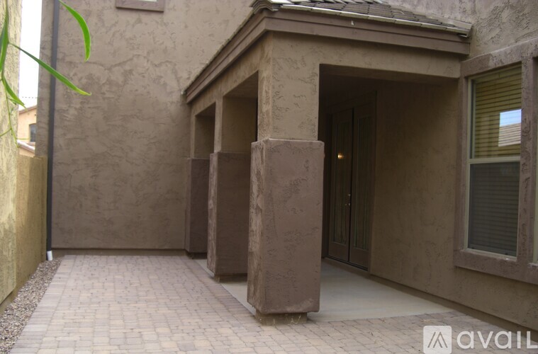 A building with a brown exterior and a doorway.