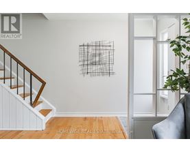A wall with a black and white drawing on it.