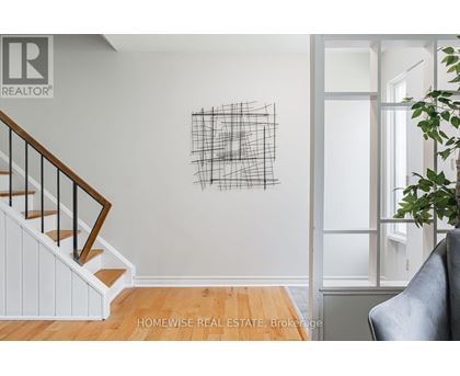 A wall with a black and white drawing on it.