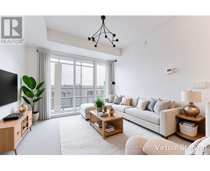 A modern living room with a large window and a view of the city.