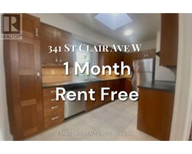 A sign advertising a 1 month rent free offer from Landlord Realty Inc.