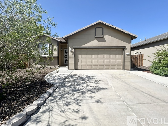 A house with a garage is available for sale.