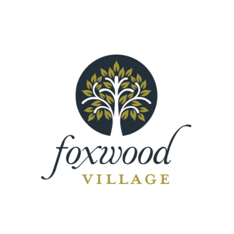 A logo for Foxwood Village features a tree in the center.