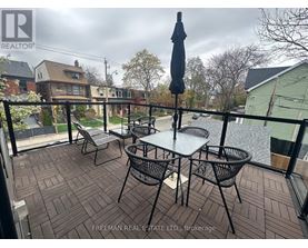 A patio with a table and chairs is shown.