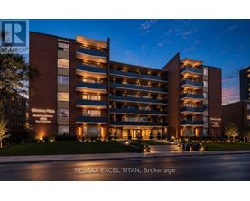 A large, well-lit apartment complex named RE/MAX EXCEL TITAN in Brokerage.