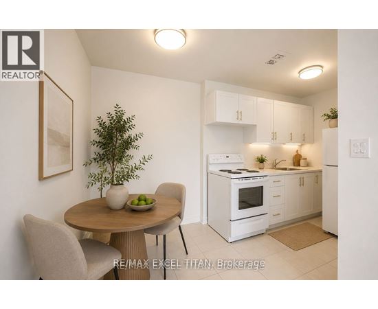 A small dining area with a table and chairs.