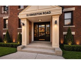 The front entrance of a building with a sign that reads "12 Kingston Road".