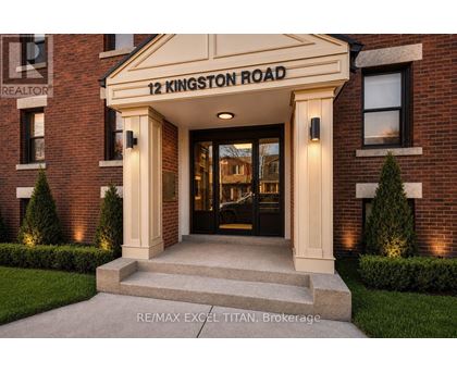 The front entrance of a building with a sign that reads "12 Kingston Road".
