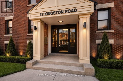 The front entrance of a building with a sign that reads "12 Kingston Road".