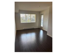 A room with a window and a door.