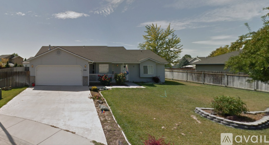 A house with a garage is available for sale.
