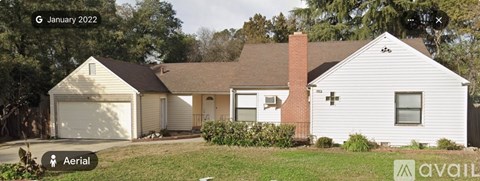 A house with a garage is for sale in January 2022.