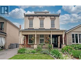 A house with a well-maintained front yard.