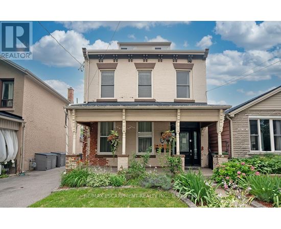 A house with a well-maintained front yard.