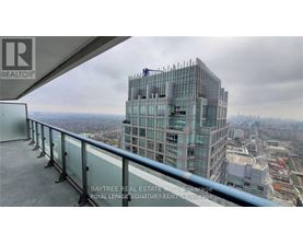 A view from a high-rise building looking down at a cityscape.