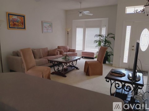 A living room with a sofa set and a coffee table.