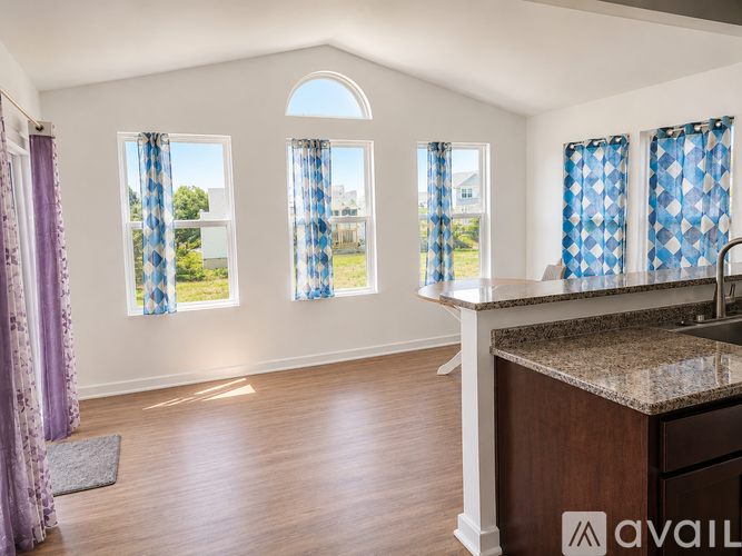 A small room with a washing machine and a dryer.