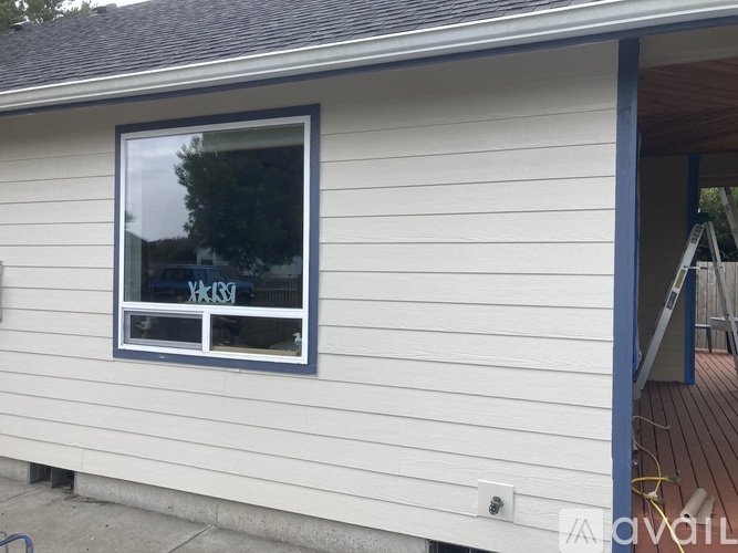 A house with a window and a ladder.