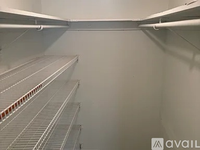 Empty shelves in a storage room.