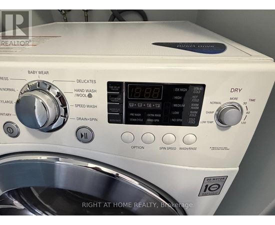 A front load washing machine with the door open.