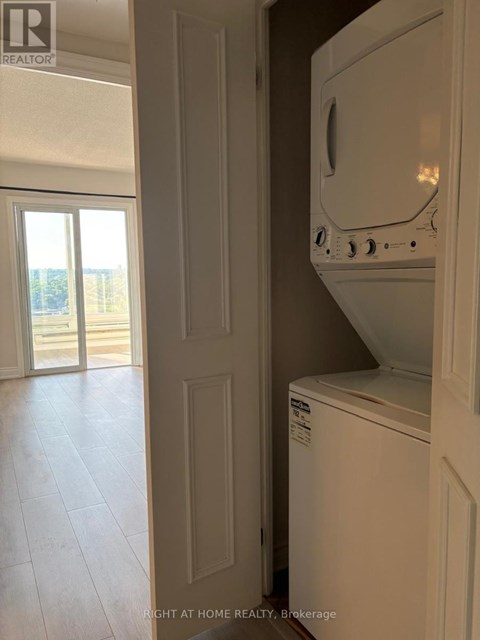 A white oven and dishwasher in a kitchen.