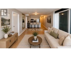 A living room with a couch, coffee table, and a sign that says "VIRTUAL STAGING".