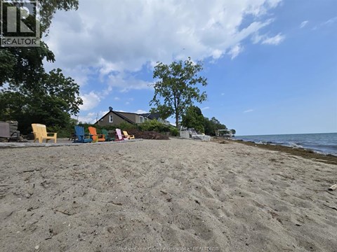 A beach with a sign that says REALTOR.