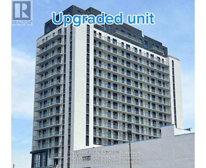A tall building with the words "Upgraded unit" written across the top.