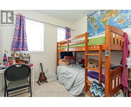 A child's bedroom with a bunk bed and a guitar.