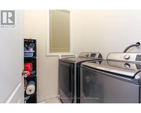 A kitchen with a microwave and oven.