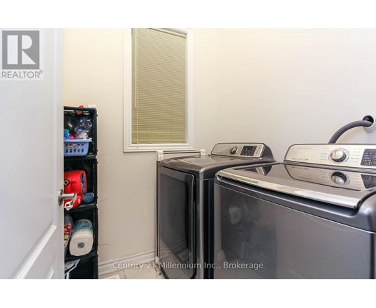 A kitchen with a microwave and oven.