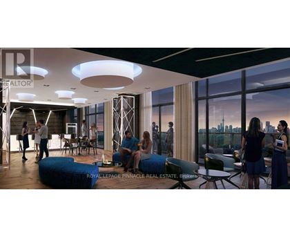 A group of people are gathered in a modern living room.