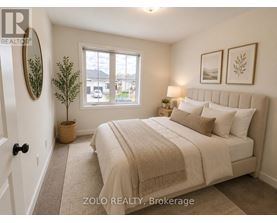 A bedroom with a large bed and a window overlooking a street.