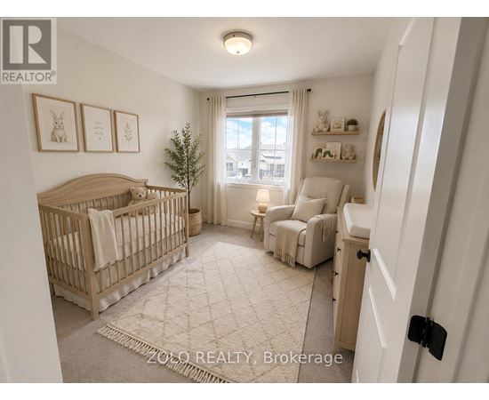 A well-lit nursery room with a crib, a chair, and a small tree.