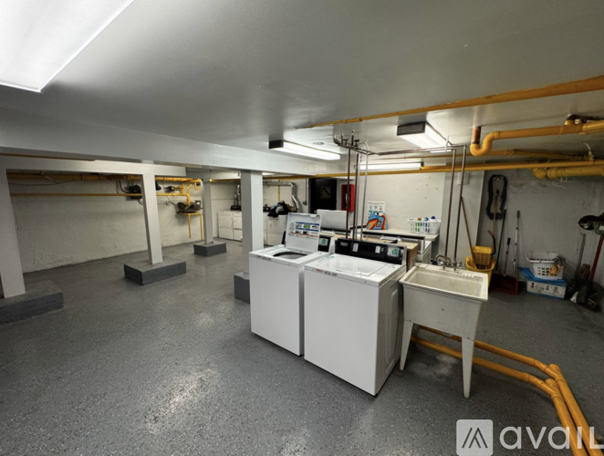 A clean, well-organized industrial workspace with various machines and equipment.