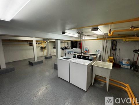 A clean, well-organized industrial workspace with various machines and equipment.