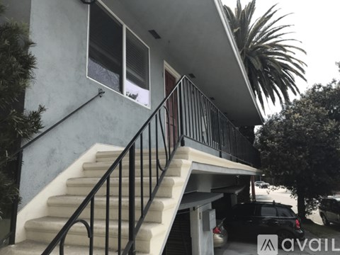 A house with a staircase leading to the second floor.