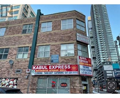 Kabul Express restaurant sign on a building.