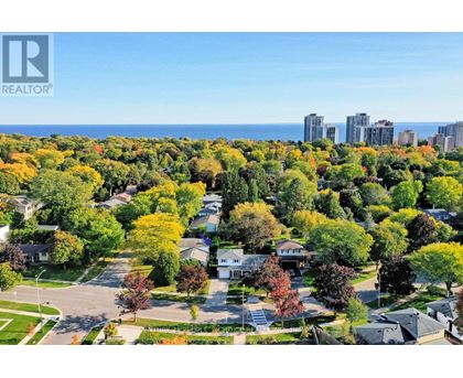 A realtor logo is on the top left corner of the image.
