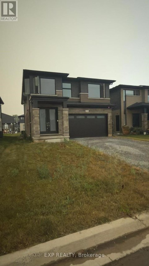 A house with a garage is shown in the image.