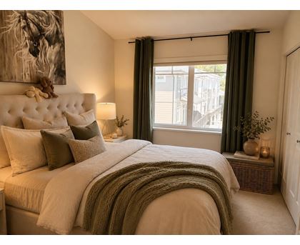 A bedroom with a large bed and a painting of a horse on the wall.